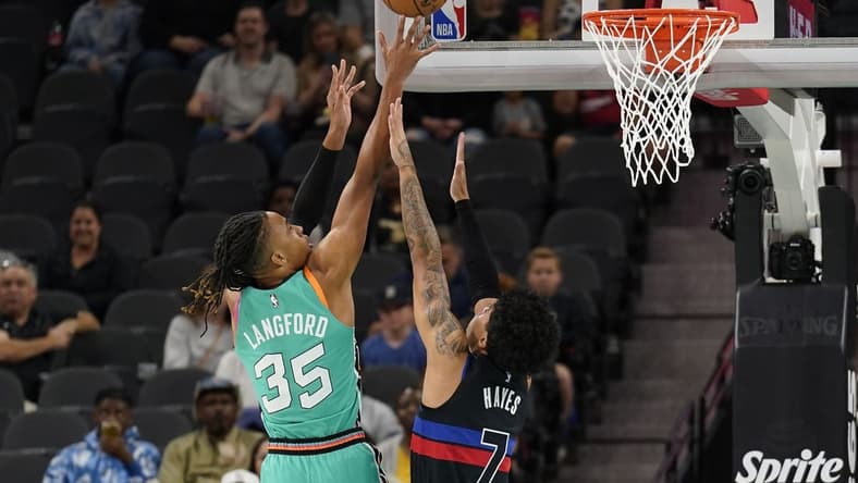 Jan 6, 2023; San Antonio, Texas, USA; San Antonio Spurs forward Keldon Johnson (3) shoots over Detroit Pistons guard Killian Hayes (7) at AT&T Center. Mandatory Credit: Scott Wachter-USA TODAY Sports