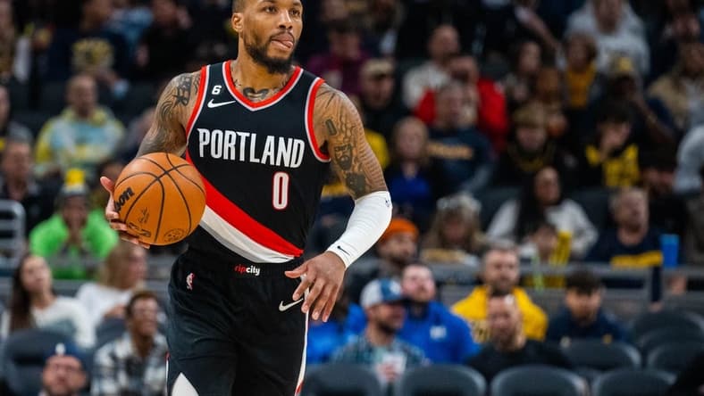 Jan 6, 2023; Indianapolis, Indiana, USA; Portland Trail Blazers guard Damian Lillard (0) dribbles the ball in the second half against the Indiana Pacers at Gainbridge Fieldhouse. Mandatory Credit: Trevor Ruszkowski-USA TODAY Sports