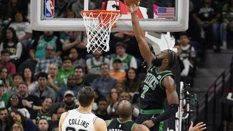 Jan 7, 2023; San Antonio, Texas, USA; Boston Celtics forward Jaylen Brown (7) lays in a basket during the first half against the San Antonio Spurs at AT&T Center. Mandatory Credit: Scott Wachter-USA TODAY Sports