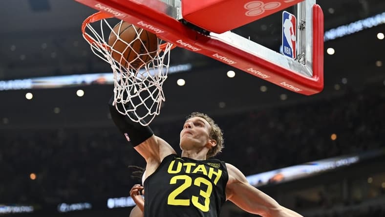 Jan 7, 2023; Chicago, Illinois, USA; Utah Jazz forward Lauri Markkanen (23) dunks the ball in the first half against the Chicago Bulls at United Center. Mandatory Credit: Jamie Sabau-USA TODAY Sports