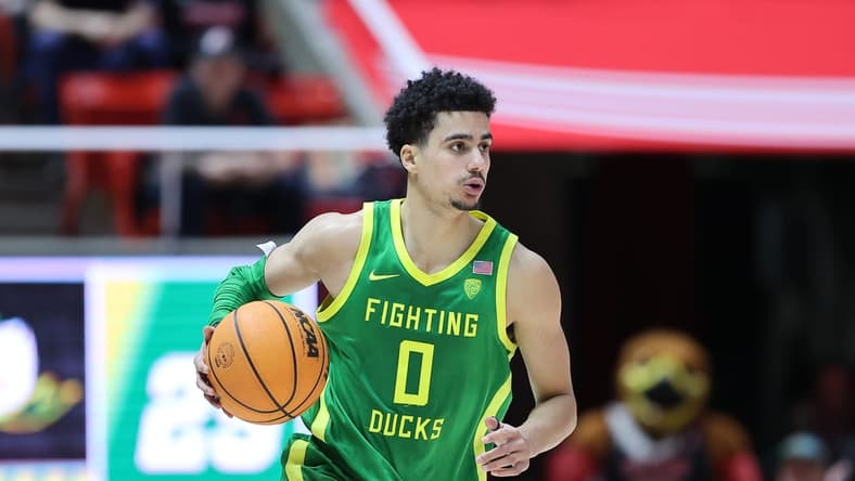 Jan 7, 2023; Salt Lake City, Utah, USA; Oregon Ducks guard Will Richardson (0) brings the ball up the court against the Utah Utes in the first half at Jon M. Huntsman Center. Mandatory Credit: Rob Gray-USA TODAY Sports