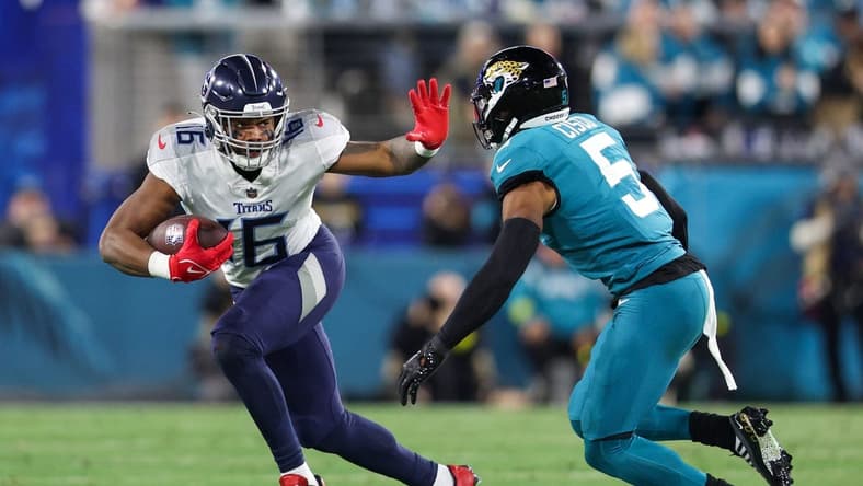 Jan 7, 2023; Jacksonville, Florida, USA; Tennessee Titans wide receiver Treylon Burks (16) runs with the ball against the Jacksonville Jaguars in the second quarter at TIAA Bank Field. Mandatory Credit: Nathan Ray Seebeck-USA TODAY Sports