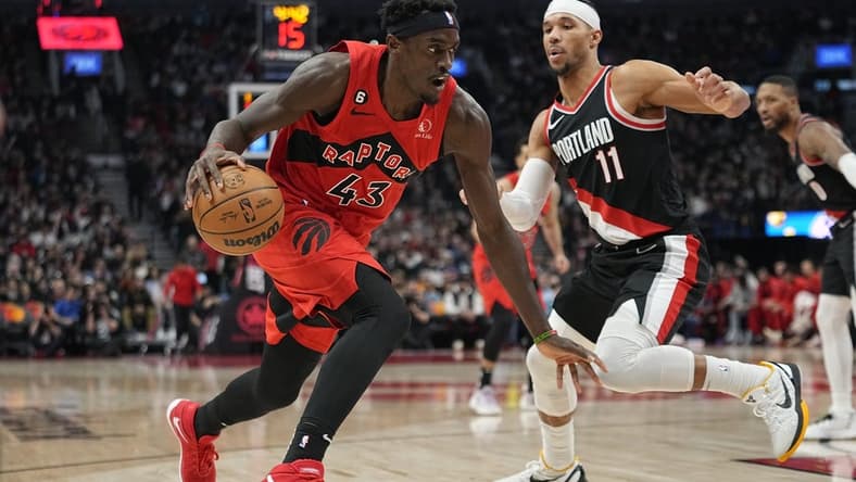 Jan 8, 2023; Toronto, Ontario, CAN; Toronto Raptors forward Pascal Siakam (43) moves to the basket against Portland Trail Blazers guard Josh Hart (11) during the first half at Scotiabank Arena. Mandatory Credit: John E. Sokolowski-USA TODAY Sports