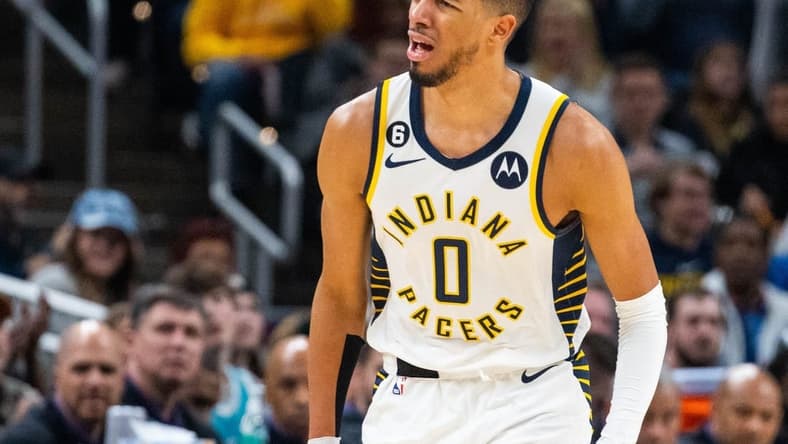 Jan 8, 2023; Indianapolis, Indiana, USA; Indiana Pacers guard Tyrese Haliburton (0) reacts to a made basket in the second half  against the Charlotte Hornets at Gainbridge Fieldhouse. Mandatory Credit: Trevor Ruszkowski-USA TODAY Sports