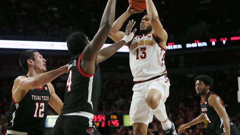 Iowa State University Cyclones guard Jaren Holmes (13) takes a shot over Texas Tech Red Raiders forward Robert Jennings (4) and forward Daniel Batcho (12) during the second half at Hilton Coliseum Tuesday, Jan 10, 2023, in Ames, Iowa. Photo by Nirmalendu Majumdar/Ames Tribune
Trxas Tech And Iowa State Men S Basketball