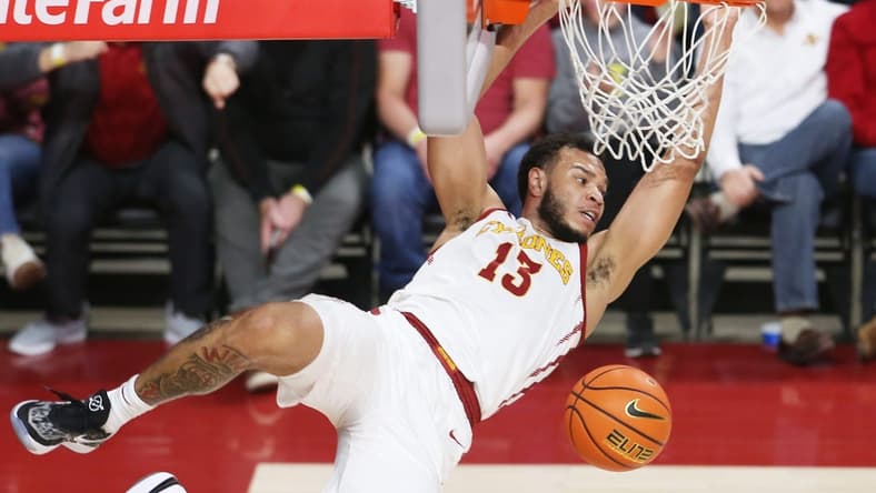 Iowa State University Cyclones guard Jaren Holmes (13) hangs out the rim after a dunk against Texas Tech Red Raiders during the second half at Hilton Coliseum Tuesday, Jan 10, 2023, in Ames, Iowa. Photo by Nirmalendu Majumdar/Ames Tribune
Trxas Tech And Iowa State Men S Basketball