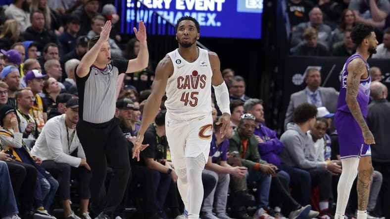 Jan 10, 2023; Salt Lake City, Utah, USA; Cleveland Cavaliers guard Donovan Mitchell (45) celebrates after scoring a three point basket against the Utah Jazz during the fourth quarter at Vivint Arena. Mandatory Credit: Chris Nicoll-USA TODAY Sports