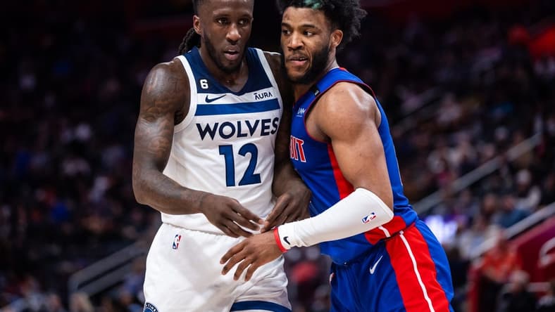 Jan 11, 2023; Detroit, Michigan, USA; Minnesota Timberwolves forward Taurean Prince (12) and Detroit Pistons forward Saddiq Bey (41) battle for position before the ball is inbounded in the second quarter at Little Caesars Arena. Mandatory Credit: Allison Farrand-USA TODAY Sports
