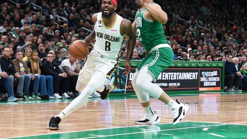Jan 11, 2023; Boston, Massachusetts, USA; New Orleans Pelicans forward Naji Marshall (8) drives to the basket as Boston Celtics forward Grant Williams (12) defends during the first half at TD Garden. Mandatory Credit: Bob DeChiara-USA TODAY Sports