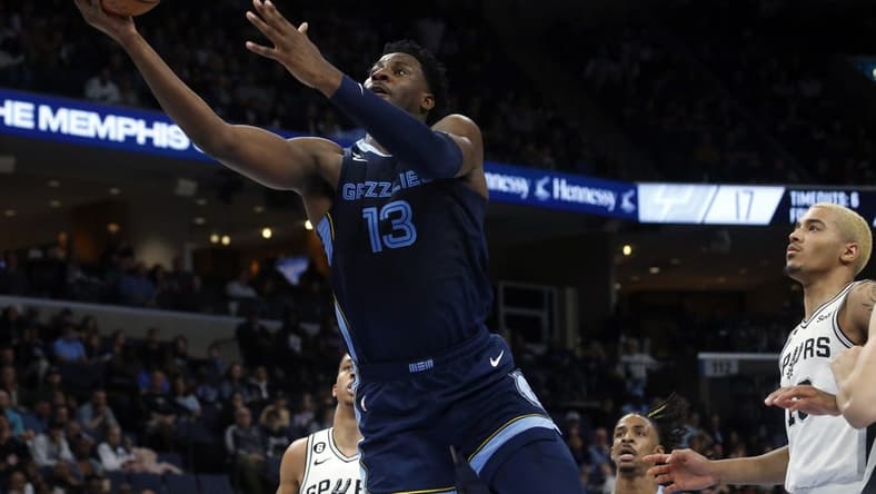 Jan 11, 2023; Memphis, Tennessee, USA; Memphis Grizzlies forward Jaren Jackson Jr. (13) drives to the basket during the first half against the San Antonio Spurs at FedExForum. Mandatory Credit: Petre Thomas-USA TODAY Sports
