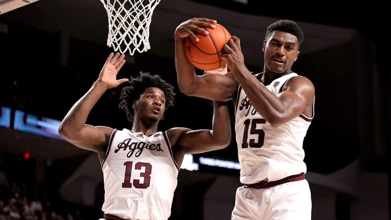 Jan 11, 2023; College Station, Texas, USA; Texas A&M Aggies forward Henry Coleman III (15) grabs a rebound away from forward Solomon Washington (13) against the Missouri Tigers during the first half at Reed Arena. Mandatory Credit: Erik Williams-USA TODAY Sports