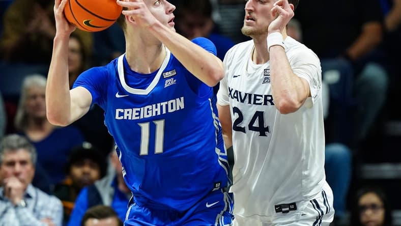 Creighton Bluejays center Ryan Kalkbrenner (11) turns toward the basket as Xavier Musketeers forward Jack Nunge (24) defends in the second half of a college basketball game, Wednesday, Jan. 11, 2023, at Cintas Center in Cincinnati. The Xavier Musketeers won, 90-87.
Creighton Bluejays At Xavier Musketeers Jan 11 0287