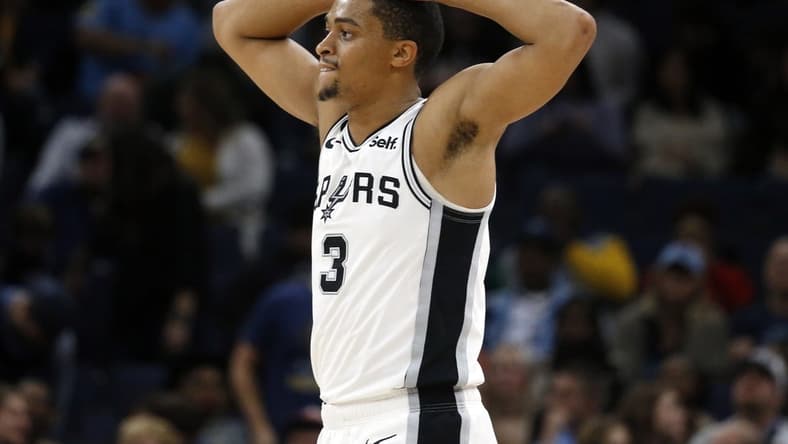 Jan 11, 2023; Memphis, Tennessee, USA; San Antonio Spurs forward Keldon Johnson (3) reacts after a foul call during the second half against the Memphis Grizzlies at FedExForum. Mandatory Credit: Petre Thomas-USA TODAY Sports