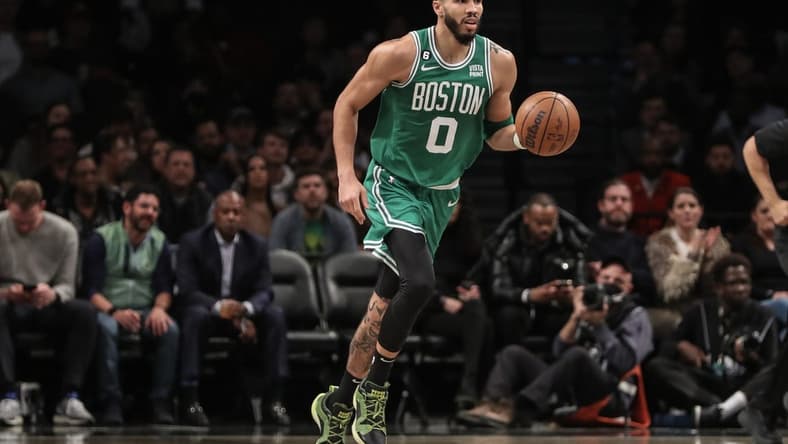 Jan 12, 2023; Brooklyn, New York, USA; Boston Celtics forward Jayson Tatum (0) brings the ball up court in the first quarter against the Brooklyn Nets at Barclays Center. Mandatory Credit: Wendell Cruz-USA TODAY Sports