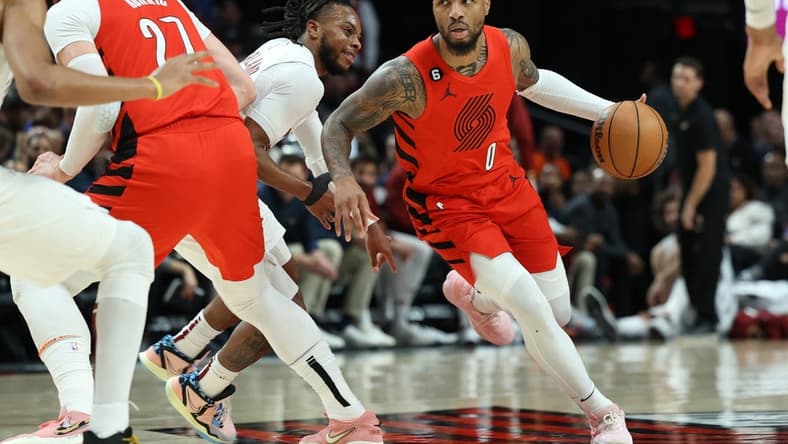 Jan 12, 2023; Portland, Oregon, USA; Portland Trail Blazers guard Damian Lillard (0) dribbles the ball against the Cleveland Cavaliers in the first half at Moda Center. Mandatory Credit: Jaime Valdez-USA TODAY Sports