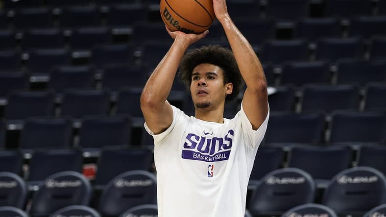 Jan 13, 2023; Minneapolis, Minnesota, USA; Phoenix Suns forward Cameron Johnson (23) warms up before the game against the Minnesota Timberwolves at Target Center. Mandatory Credit: Matt Krohn-USA TODAY Sports