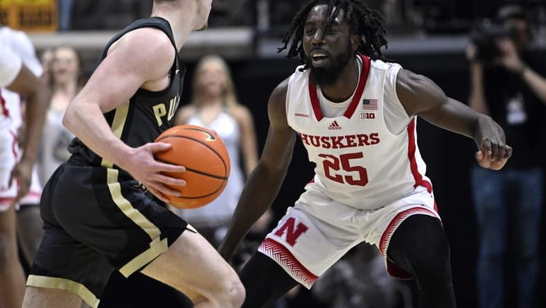 Jan 13, 2023; West Lafayette, Indiana, USA; Nebraska Cornhuskers guard Emmanuel Bandoumel (25) defends against Purdue Boilermakers guard Braden Smith (3) during the first half at Mackey Arena. Mandatory Credit: Marc Lebryk-USA TODAY Sports