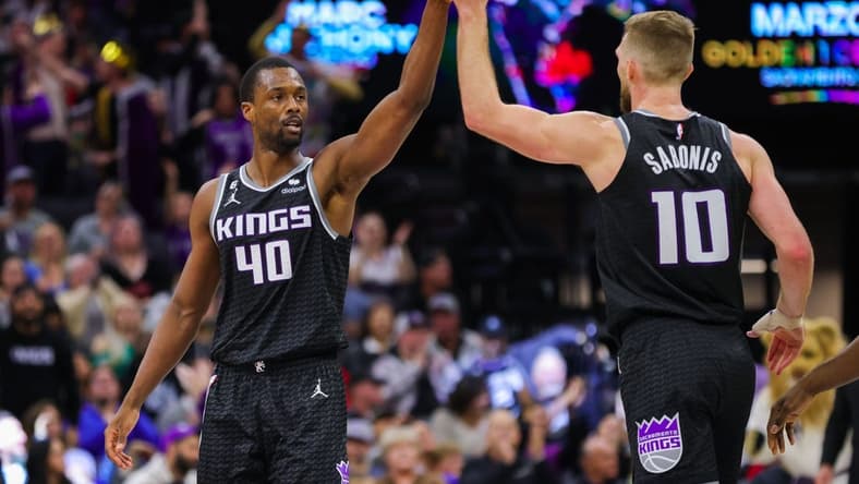 Jan 13, 2023; Sacramento, California, USA; Sacramento Kings forward Harrison Barnes (40) celebrates with forward Domantas Sabonis (10) during the fourth quarter against the Houston Rockets at Golden 1 Center. Mandatory Credit: Sergio Estrada-USA TODAY Sports