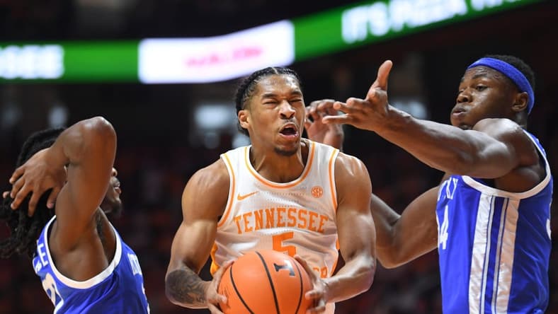 Tennessee guard Zakai Zeigler (5) takes a shot while defended during a game between the Tennessee Vols and the Kentucky Wildcats, in Thompson-Boling Arena, in Knoxville, Tenn., Saturday, Jan. 14, 2023.
Volskentucky0114 0589