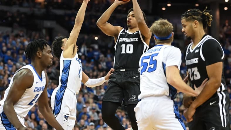 Jan 14, 2023; Omaha, Nebraska, USA; Providence Friars guard Noah Locke (10) attempts a shot over Creighton Bluejays guard Ryan Nembhard (2) in the first half at CHI Health Center Omaha. Mandatory Credit: Steven Branscombe-USA TODAY Sports