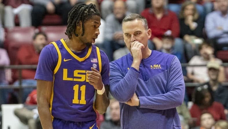 Jan 14, 2023; Tuscaloosa, Alabama, USA; LSU Tigers guard Justice Williams (11) talks to head coach Matt McMahon during the second half against the Alabama Crimson Tide at Coleman Coliseum. Mandatory Credit: Marvin Gentry-USA TODAY Sports