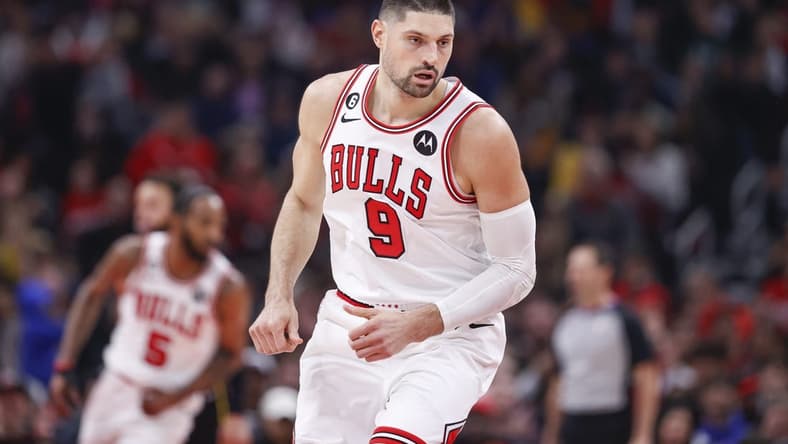 Jan 15, 2023; Chicago, Illinois, USA; Chicago Bulls center Nikola Vucevic (9) reacts after scoring against the Golden State Warriors during the first half at United Center. Mandatory Credit: Kamil Krzaczynski-USA TODAY Sports