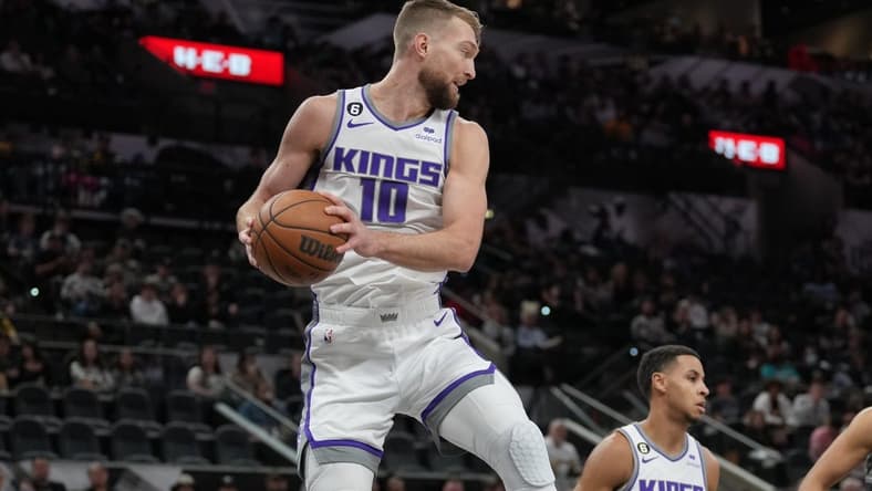 Jan 15, 2023; San Antonio, Texas, USA;  Sacramento Kings forward Domantas Sabonis (10) rebounds in the first half against the San Antonio Spurs at the AT&T Center. Mandatory Credit: Daniel Dunn-USA TODAY Sports