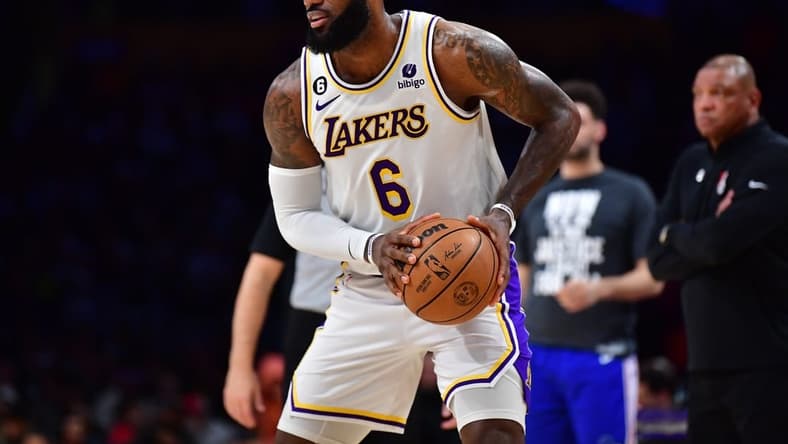 Jan 15, 2023; Los Angeles, California, USA; Los Angeles Lakers forward LeBron James (6) controls the ball against the Philadelphia 76ers during the second half at Crypto.com Arena. Mandatory Credit: Gary A. Vasquez-USA TODAY Sports