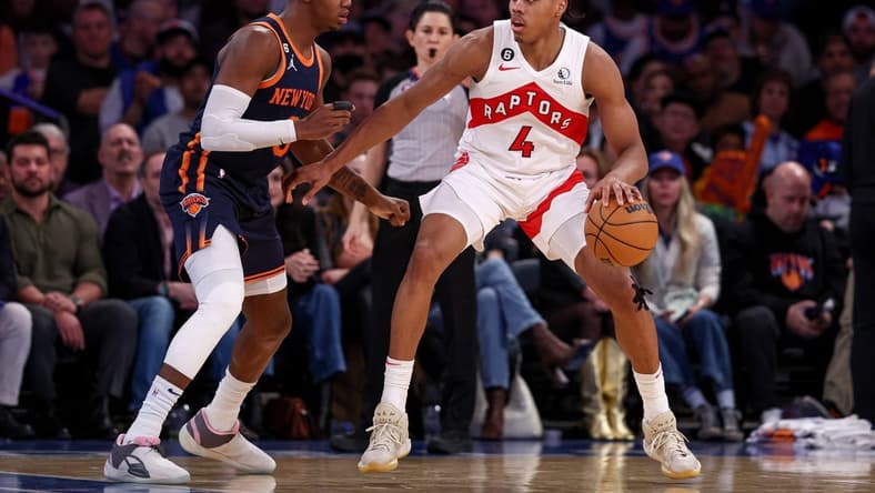 Jan 16, 2023; New York, New York, USA; Toronto Raptors forward Scottie Barnes (4) dribbles against New York Knicks guard RJ Barrett (9) during the second half at Madison Square Garden. Mandatory Credit: Vincent Carchietta-USA TODAY Sports