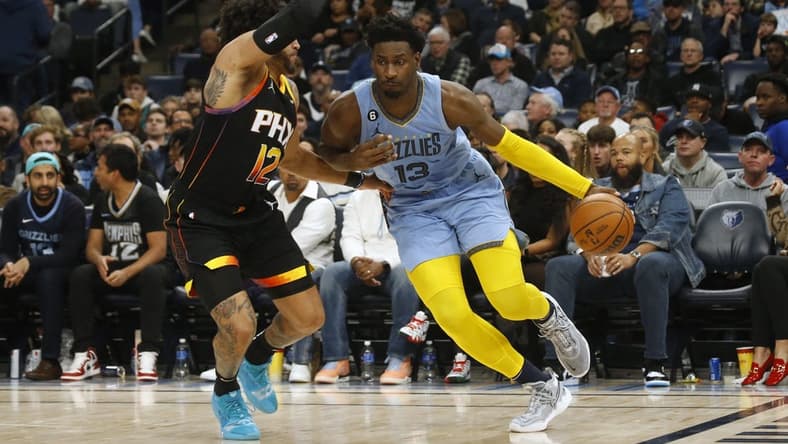 Jan 16, 2023; Memphis, Tennessee, USA; Memphis Grizzlies forward Jaren Jackson Jr. (13) drives to the basket as Phoenix Suns forward Ish Wainright (12) defends during the first half at FedExForum. Mandatory Credit: Petre Thomas-USA TODAY Sports