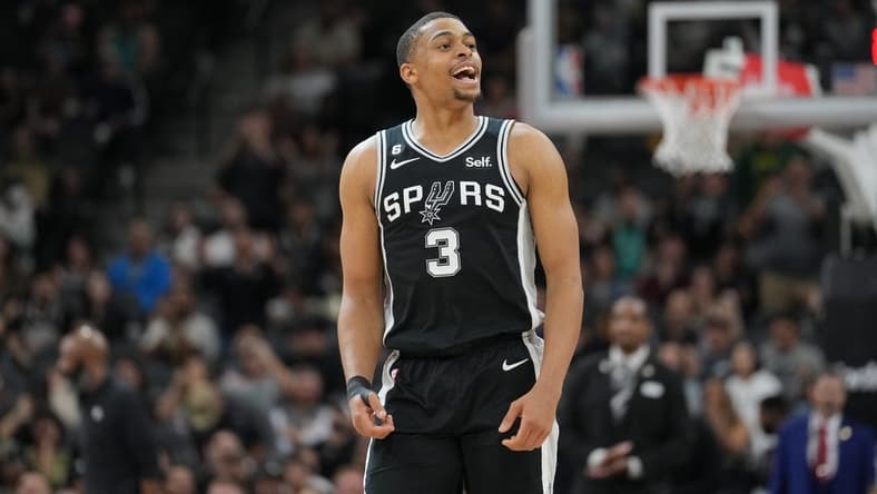 Jan 17, 2023; San Antonio, Texas, USA; San Antonio Spurs forward Keldon Johnson (3) looks at the crowd after making a three point shot in the second half against the Brooklyn Nets at the AT&T Center. Mandatory Credit: Daniel Dunn-USA TODAY Sports