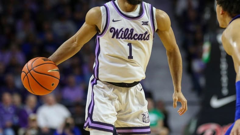 Jan 17, 2023; Manhattan, Kansas, USA; Kansas State Wildcats guard Markquis Nowell (1) brings the ball up court during the first half against the Kansas Jayhawks at Bramlage Coliseum. Mandatory Credit: Scott Sewell-USA TODAY Sports