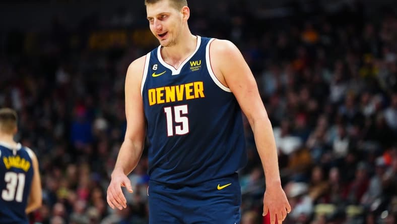 Jan 17, 2023; Denver, Colorado, USA; Denver Nuggets center Nikola Jokic (15) reacts in the second half against the Portland Trail Blazers at Ball Arena. Mandatory Credit: Ron Chenoy-USA TODAY Sports