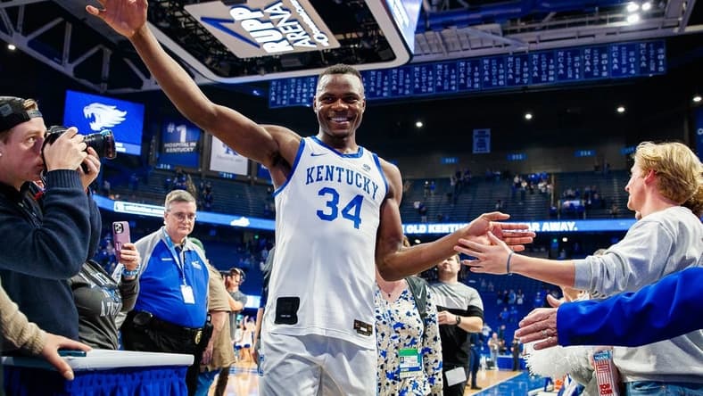 Jan 17, 2023; Lexington, Kentucky, USA; Kentucky Wildcats forward Oscar Tshiebwe (34) greets fans after the game against the Georgia Bulldogs at Rupp Arena at Central Bank Center. Mandatory Credit: Jordan Prather-USA TODAY Sports