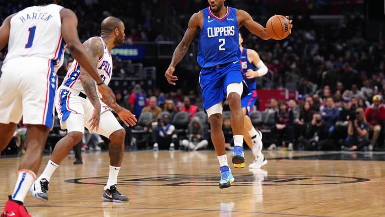 Jan 17, 2023; Los Angeles, California, USA; LA Clippers forward Kawhi Leonard (2) dribbles the ball against the Philadelphia 76ers in the second half at Crypto.com Arena. Mandatory Credit: Kirby Lee-USA TODAY Sports