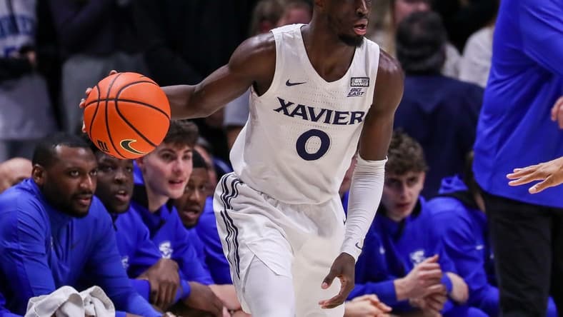 Jan 11, 2023; Cincinnati, Ohio, USA; Xavier Musketeers guard Souley Boum (0) dribbles against the Creighton Bluejays in the first half at Cintas Center. Mandatory Credit: Katie Stratman-USA TODAY Sports