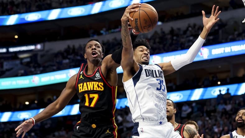 Jan 18, 2023; Dallas, Texas, USA; Dallas Mavericks forward Christian Wood (35) and Atlanta Hawks forward Onyeka Okongwu (17) go for the loose ball during the first quarter at American Airlines Center. Mandatory Credit: Kevin Jairaj-USA TODAY Sports
