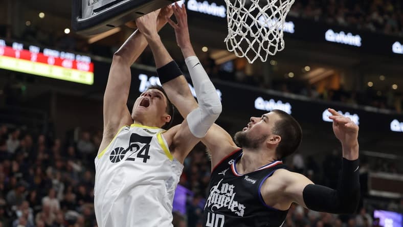 Jan 18, 2023; Salt Lake City, Utah, USA; LA Clippers center Ivica Zubac (40) blocks the shot of Utah Jazz center Walker Kessler (24) during the first quarter at Vivint Arena. Mandatory Credit: Chris Nicoll-USA TODAY Sports
