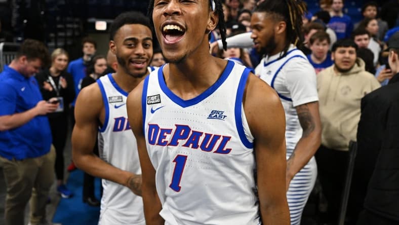 Jan 18, 2023; Chicago, Illinois, USA; DePaul Blue Demons forward Javan Johnson (1) celebrates after upsetting the Xavier Musketeers 73-72at Wintrust Arena. Mandatory Credit: Jamie Sabau-USA TODAY Sports