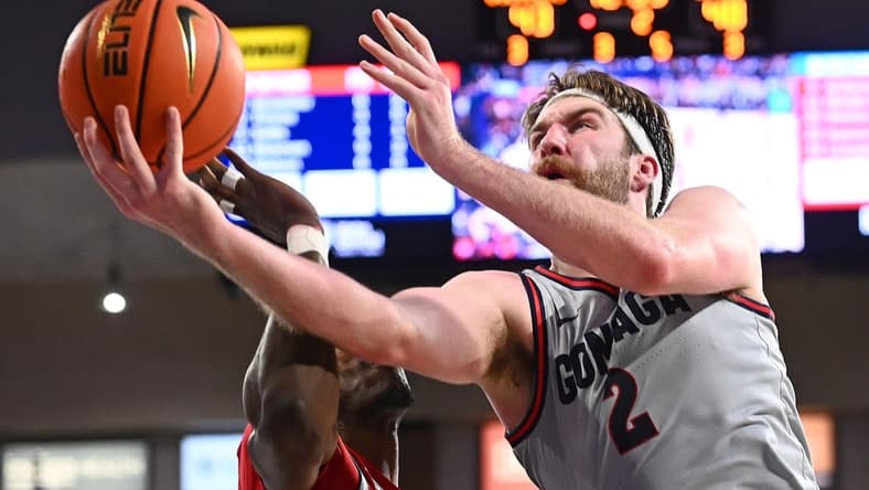 Jan 19, 2023; Spokane, Washington, USA; Gonzaga Bulldogs forward Drew Timme (2) shoots the ball against Loyola Marymount Lions center Rick Issanza (22) in the second half at McCarthey Athletic Center. Lions won 68-67. Mandatory Credit: James Snook-USA TODAY Sports