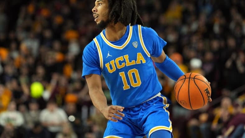 Jan 19, 2023; Tempe, Arizona, USA; UCLA Bruins guard Tyger Campbell (10) dribbles against the Arizona State Sun Devils during the first half at Desert Financial Arena. Mandatory Credit: Joe Camporeale-USA TODAY Sports