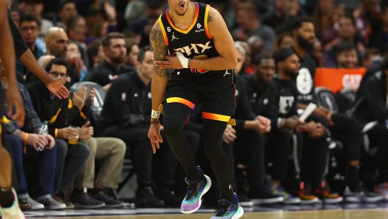 Jan 19, 2023; Phoenix, Arizona, USA; Phoenix Suns guard Damion Lee (10) reacts after a shot against the Brooklyn Nets in the second half at Footprint Center. Mandatory Credit: Mark J. Rebilas-USA TODAY Sports