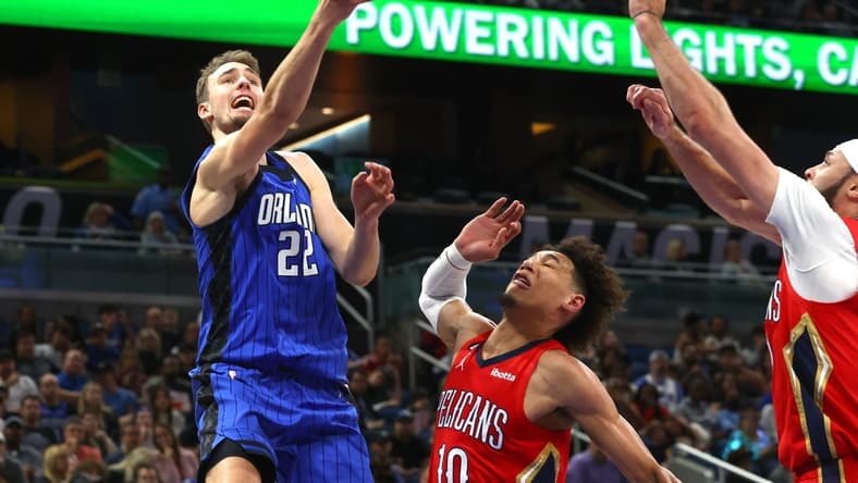 Jan 20, 2023; Orlando, Florida, USA; New Orleans Pelicans center Jaxson Hayes (10) fouls Orlando Magic forward Franz Wagner (22) during the first quarter at Amway Center. Mandatory Credit: Kim Klement-USA TODAY Sports
