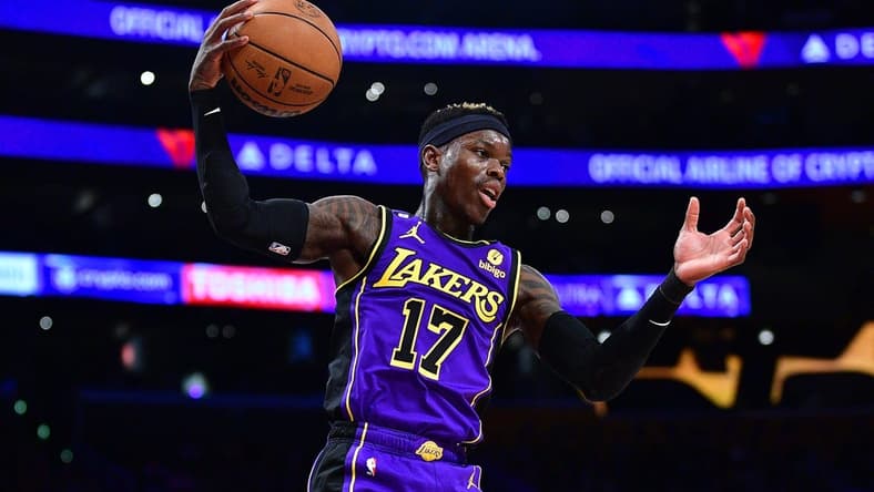 January 20, 2023; Los Angeles, California, USA; Los Angeles Lakers guard Dennis Schroder (17) gets a rebound against the Memphis Grizzlies during the second half at Crypto.com Arena. Mandatory Credit: Gary A. Vasquez-USA TODAY Sports