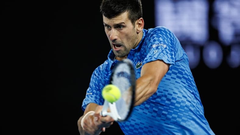 Jan 21, 2023; Melbourne, Victoria, Australia; Novak Djokovic of Serbia celebrates his victory over Grigor Dimitrov of Bulgaria on day six of the 2023 Australian Open tennis tournament at Melbourne Park. Mandatory Credit: Mike Frey-USA TODAY Sports