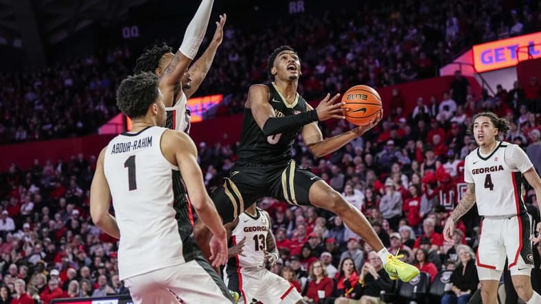 Jan 21, 2023; Athens, Georgia, USA; Vanderbilt Commodores guard Tyrin Lawrence (0) jumps towards the basket against the Georgia Bulldogs during the first half at Stegeman Coliseum. Mandatory Credit: Dale Zanine-USA TODAY Sports