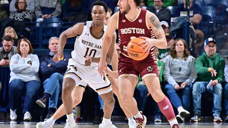 Jan 21, 2023; South Bend, Indiana, USA; Boston College Eagles guard Jaeden Zackery (3) dribbles the ball against Notre Dame Fighting Irish guard Marcus Hammond (10) in the first half at the Purcell Pavilion. Mandatory Credit: Matt Cashore-USA TODAY Sports
