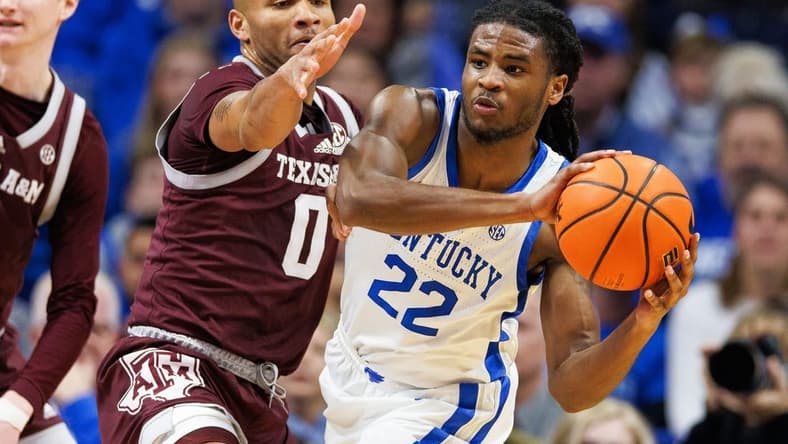 Jan 21, 2023; Lexington, Kentucky, USA; Kentucky Wildcats guard Cason Wallace (22) passes the ball during the first half against the Texas A&M Aggies at Rupp Arena at Central Bank Center. Mandatory Credit: Jordan Prather-USA TODAY Sports