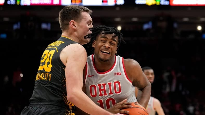 Jan 21, 2023; Columbus, OH, USA; Ohio State Buckeyes forward Brice Sensabaugh (10) collides with Iowa Hawkeyes forward Payton Sandfort (20) during the first half of the NCAA division I men s basketball game between the Ohio State Buckeyes and the Iowa Hawkeyes at Value City Arena. Mandatory Credit: Joseph Scheller-The Columbus Dispatch
Basketball Ceb Mbk Iowa Iowa At Ohio State