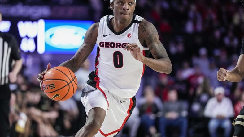 Jan 21, 2023; Athens, Georgia, USA; Georgia Bulldogs guard Terry Roberts (0) brings the ball up the court against the Vanderbilt Commodores during the second half at Stegeman Coliseum. Mandatory Credit: Dale Zanine-USA TODAY Sports